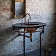 BLACKHEATH_WAREHOUSE_KINROSS_WASHSTAND_NERO_MARQUINA_MARBLE_COPPER_BOWL_AGED_COPPER_FRAME_ANGLED_MARBLE_BLACKENED.jpg