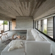 architect-luciano-kruk-designs-a-house-made-of-three-stacked-forms-of-rough-unfinished-concrete-over-150963445448kgn