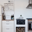 Scandinavian-kitchen-with-small-wood-burning-stove