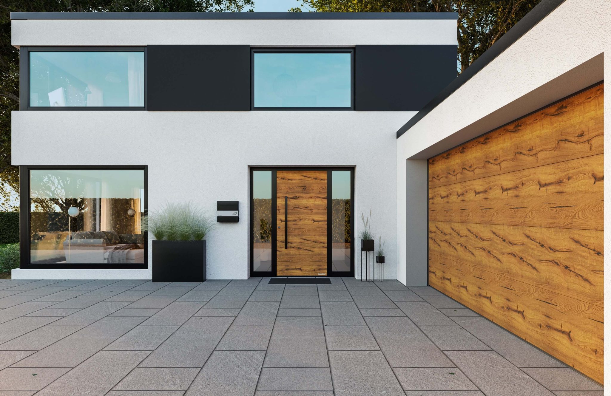 Estetska harmonija: sekcijska garažna in vhodna vrata enakega dizajna