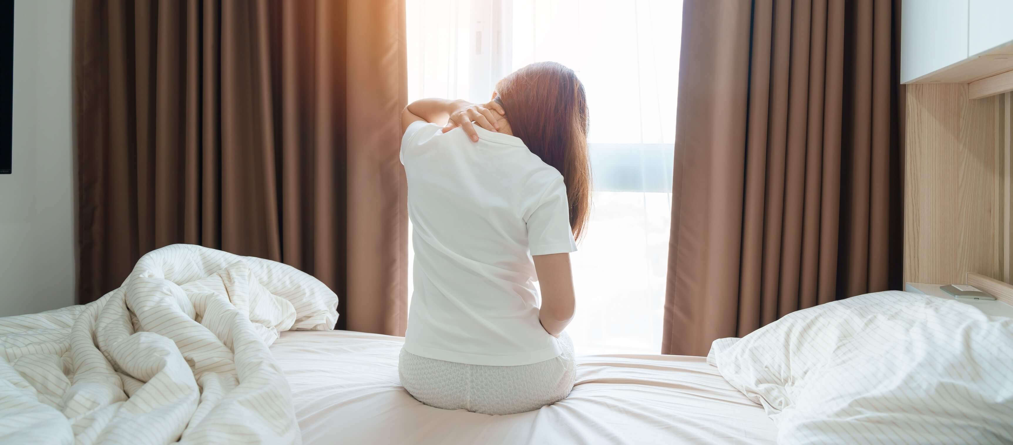 Vas bolijo vrat in ramena? Morda je kriv vaš vzglavnik